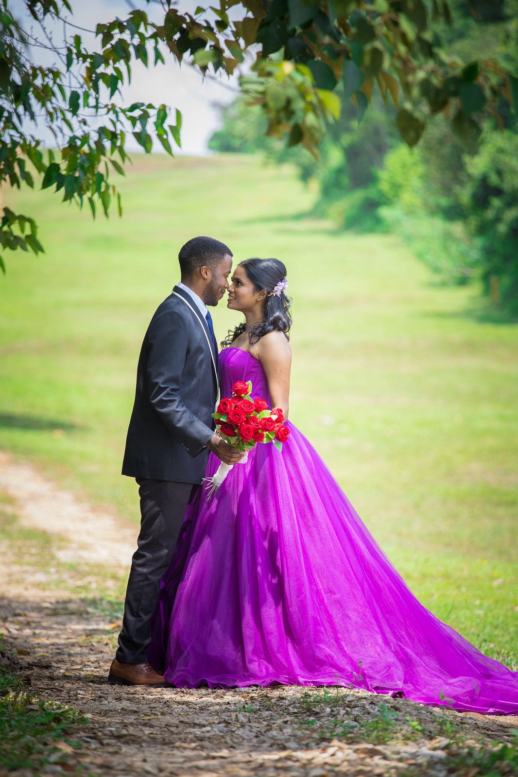 Aghalya and Munshya nose to nose on a leafy path